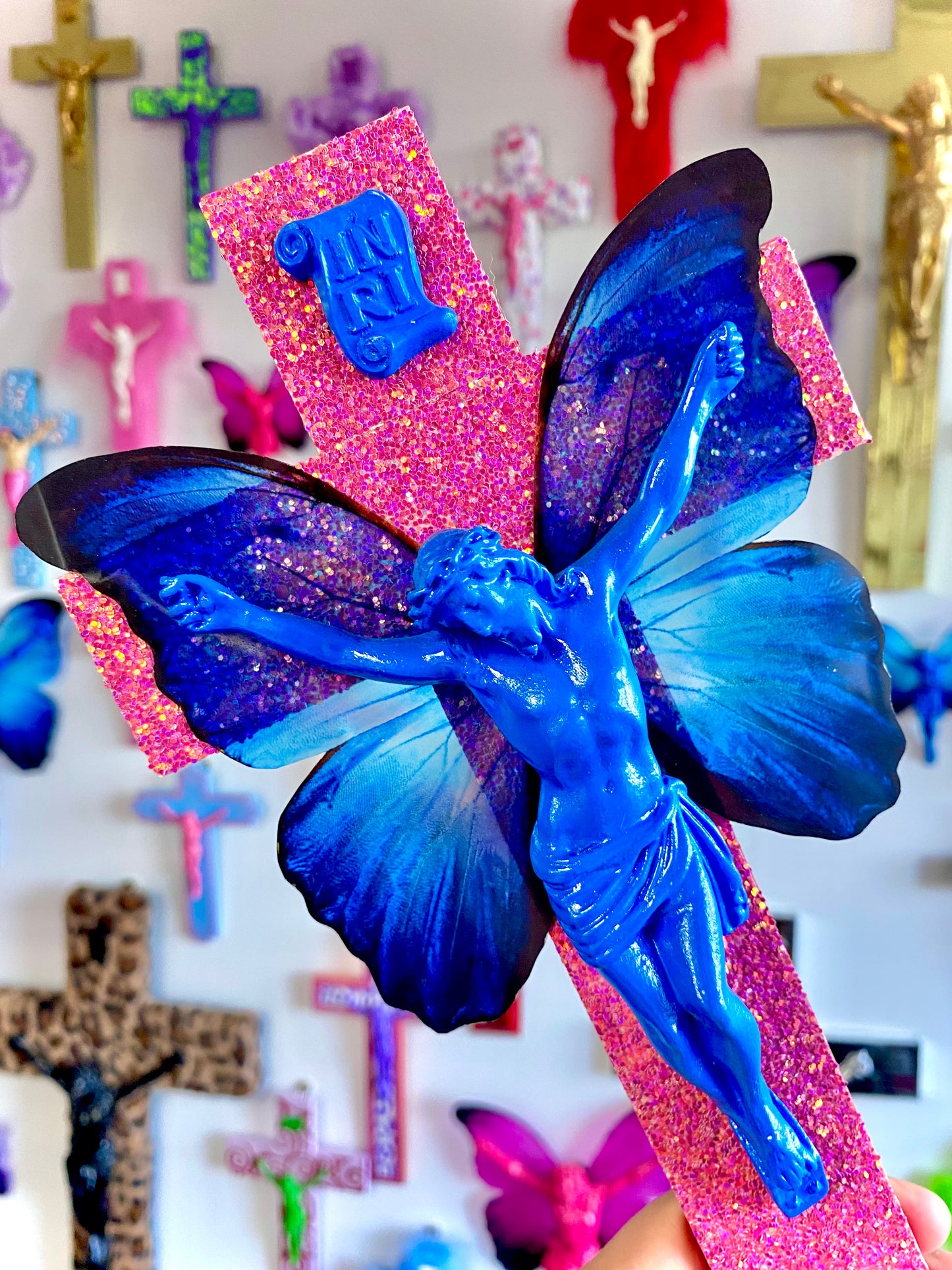 Crucifix Papillion Bleu God is Queer